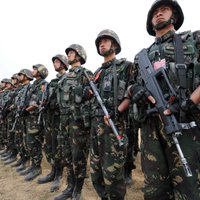 Китай начинает "серию операций" возле Тайваня