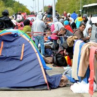 Sadursmēs migrantu nometnē Vācijā 14 ievainotie