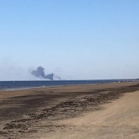 Kūlas ugunsgrēks Daugavgrīvā rada pamatīgu dūmu mākoni