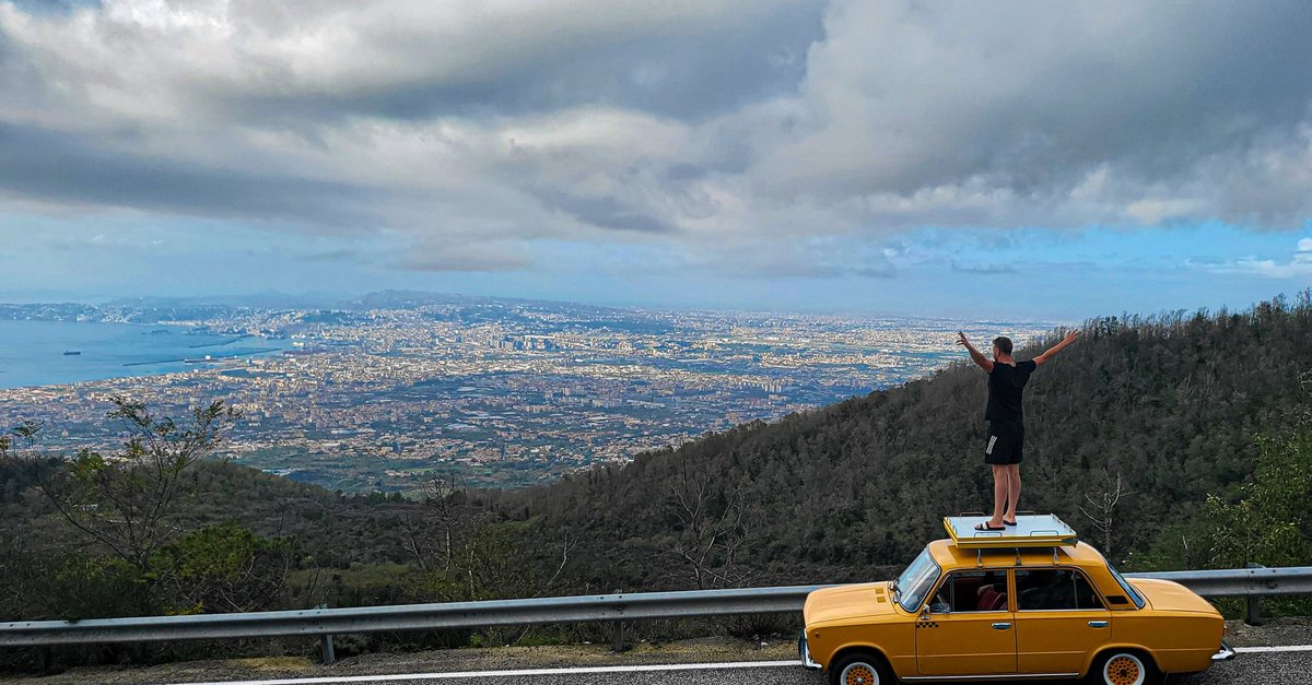 Man Embarks on Epic Cross-Europe Journey in Yellow 1980 Retro Car