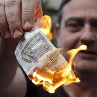 Греция закрыла банки и ввела лимит на снятие наличных