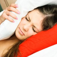 Почему болит голова после дневного сна?