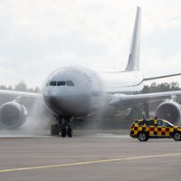 Foto: Lidosta Rīga sagaida pirmo čarterlidojumu no Korejas