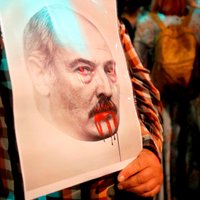 Беларусь: минского активиста приговорили к двум годам колонии за надпись "Не забудем"