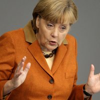 Давос: Меркель призывает ужесточить контроль над финансовыми рынками