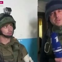 Krievijas TV parāda, kā kaujinieki no dzīvojamās ēkas apšauda Ukrainas spēkus