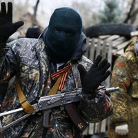 Наблюдатели: здания в Славянске захватывали "ополченцы" c АК-47 и пулеметами