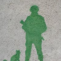 Foto: Viļņā uz mājas sienas parādījies 'zaļais cilvēciņš'