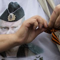 Мужчина пришел на выборы в майке с портретом Путина