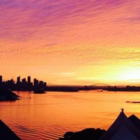 Pasauli sajūsmina krāšņs saulriets Sidnejā