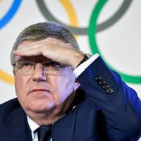 Международный олимпийский комитет временно лишил функций Олимпийский комитет России