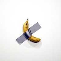 Banāna neprāts. Viedokļu vētru un parodijas izraisa ASV pārdotais mākslas darbs 'Komiķis'