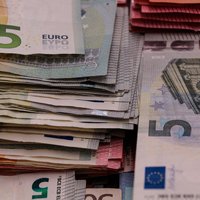 Cоциальные партнеры договорились повысить минимальную зарплату в Латвии