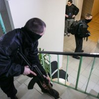 Foto: Lietuvas policisti un robežsargi mācās ķert 'zaļos cilvēciņus'