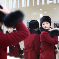 Foto: Kā Ziemeļkorejas 'skaistuļu armija' ieradās uz olimpiādi